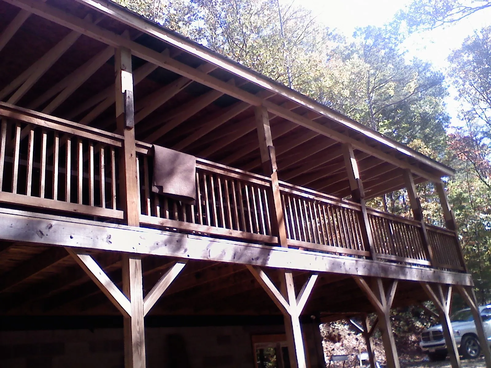 Timber framing under a new elevated porch and deck — Roof Leak Repair in Fort Payne by Roofing Brothers
